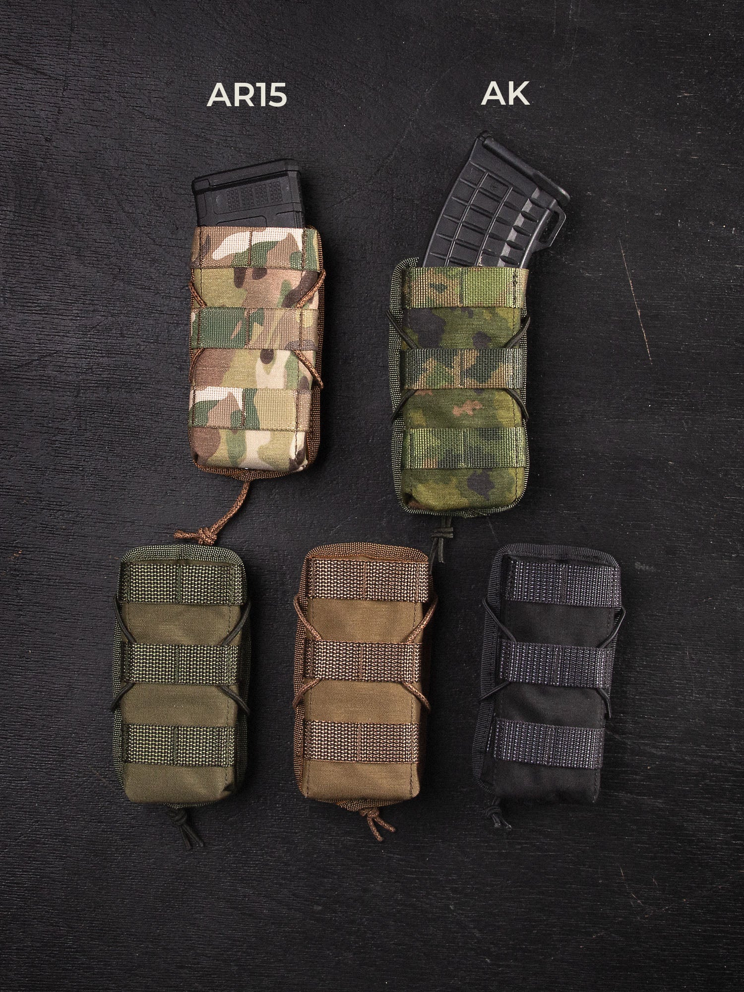Five differently colored (Multicam, M05 woodland, green, brown and black) Savotta AR15-AK mag pouches on a dark background, labeled for AR15 and AK