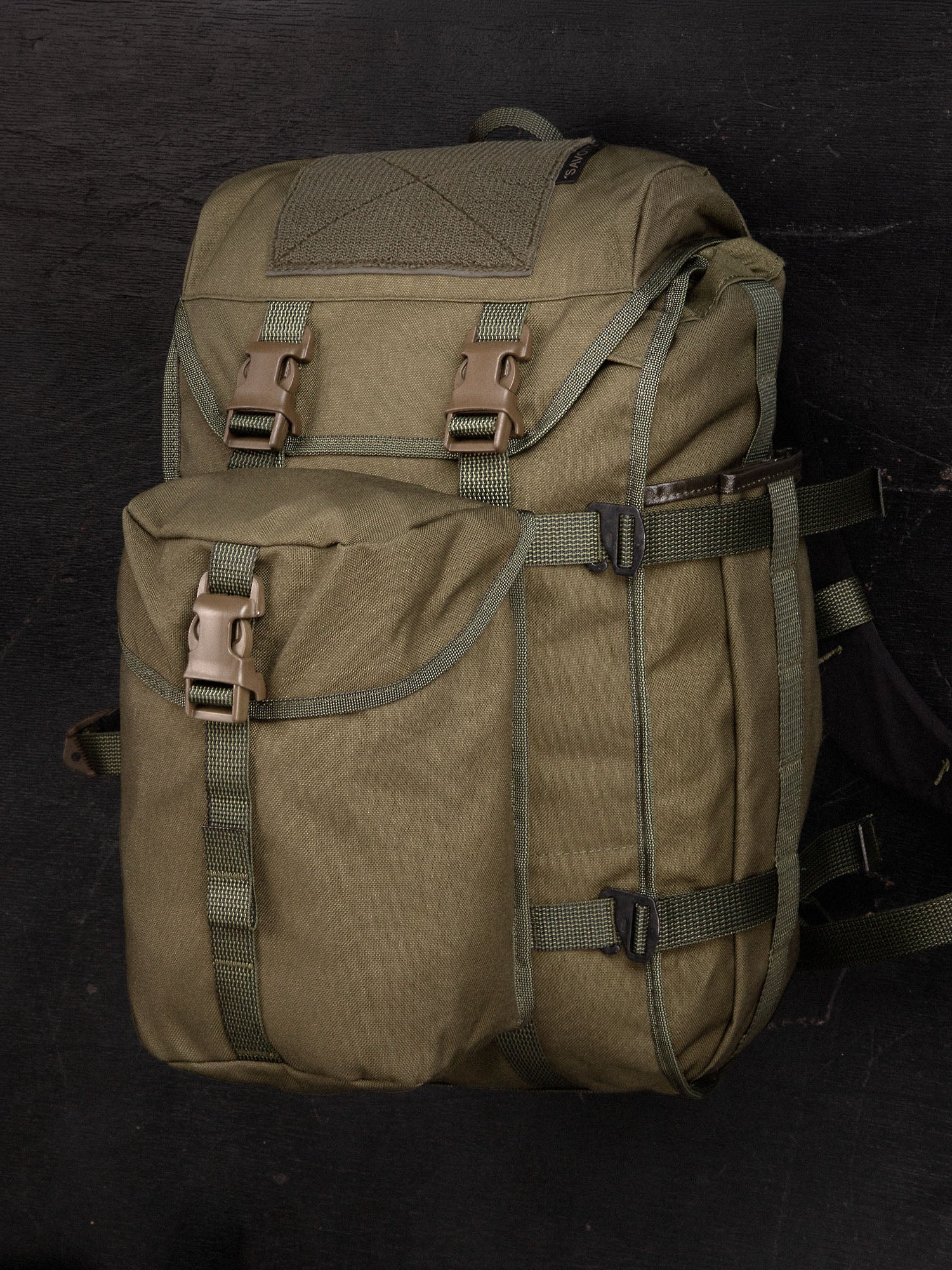 Savotta lidded GP pouch 4x5  attached to Savotta Kahakka 25L backpack