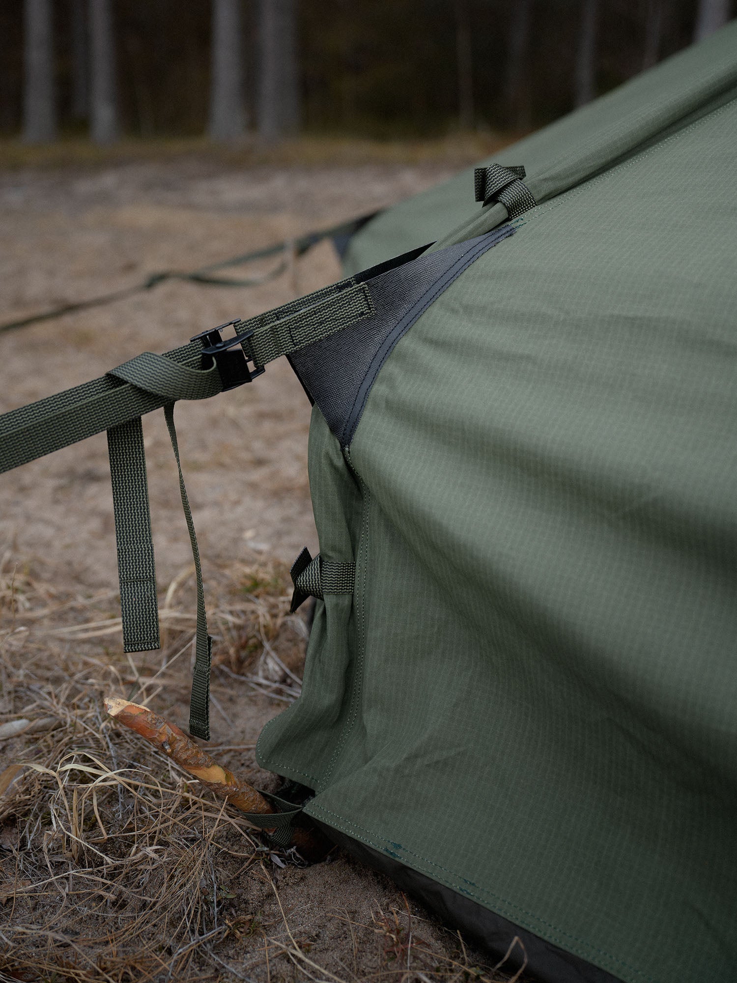Savotta Hawu 8 tent guy lines and ground level stake on a natural outdoor background