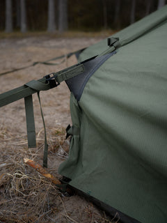 Savotta Hawu 8 tent guy lines and ground level stake on a natural outdoor background