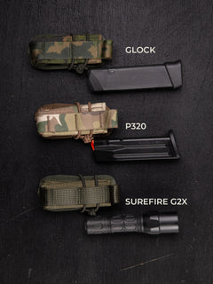 Three differently colored (M05 woodland, Multicam and green) Savotta pistol magazine pouches with labels for Glock, P320, and Surefire G2X on a black background.